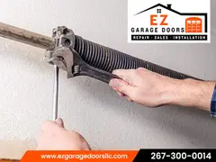 Fast & Reliable Garage Door Spring Repair Service - EZ Garage Doors