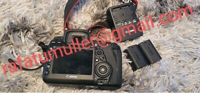 Canon EOS IV available with Len's box black - 1/3
